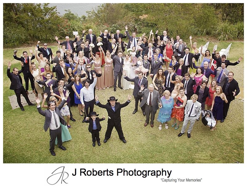Wedding guests on the Harbour Lawns at Gunners' Barracks Mosman - sydney wedding photographer